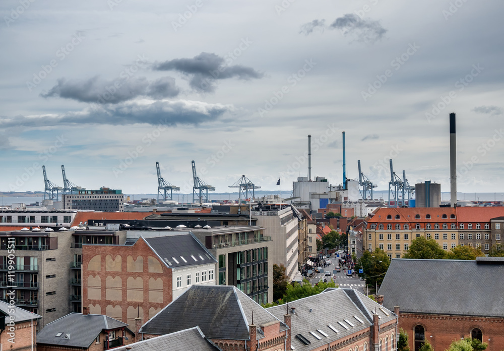 Aarhus skyline with harbor and cranes in Denmark