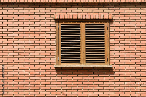 Simple House Window On Red Brick Wall