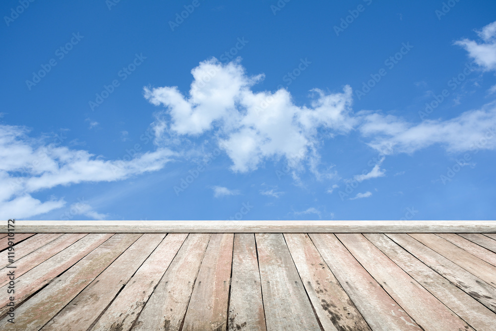 Wooden floor blue sky background
