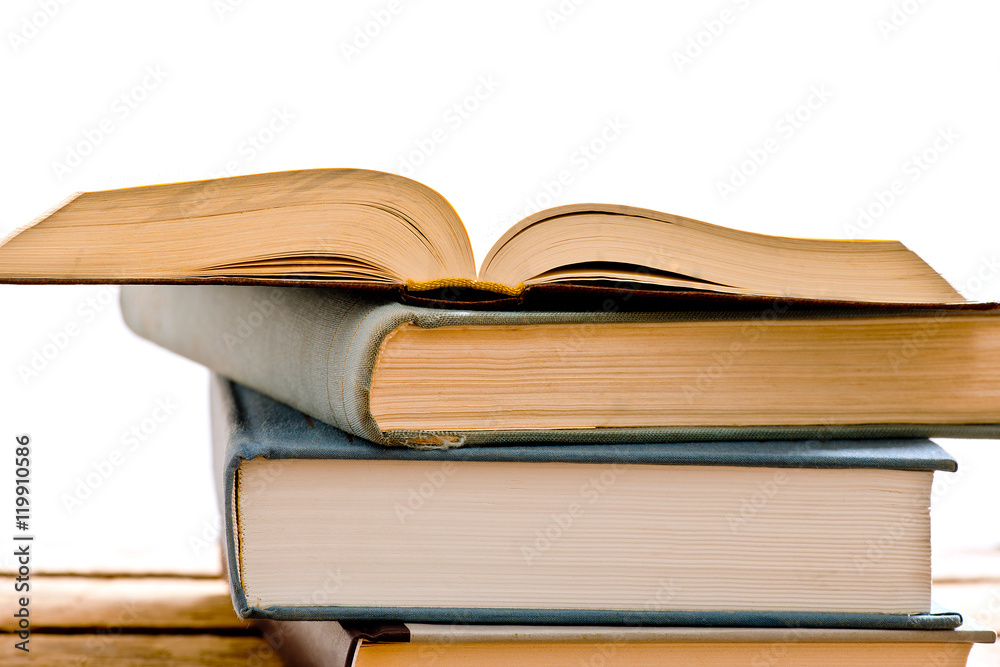 heap of open books heap of open books