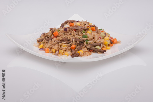 salad in a white plate on a white background