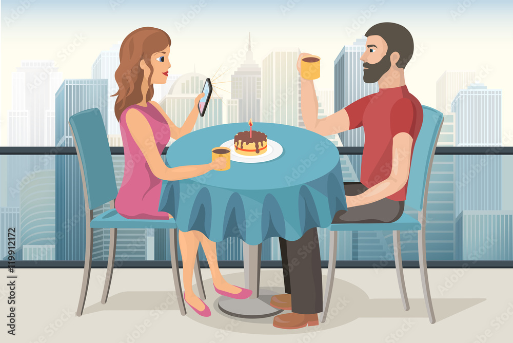 Couple on a date in roof top cafe Couple on a date in roof top cafe