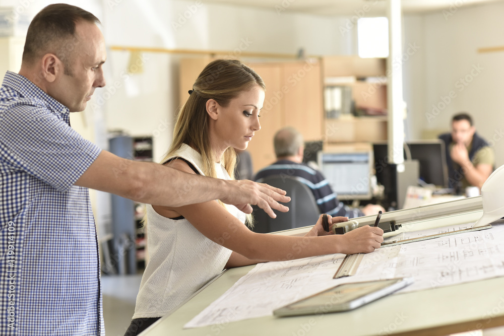 Fototapeta premium Young woman in engineering training class