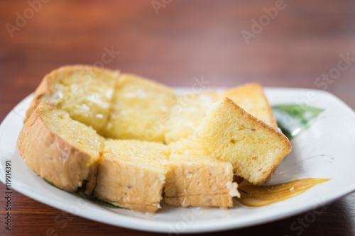 Bread toast and drips of condensed milk