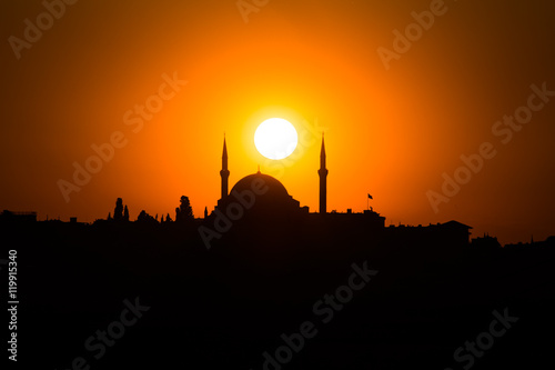 sunset and silhouette of a mosque in Istanbul