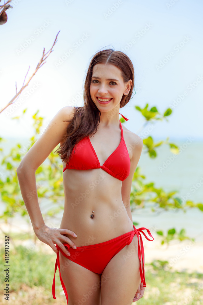 Beautiful women, bikinis, sea red background. Beautiful women, bikinis, sea red background.