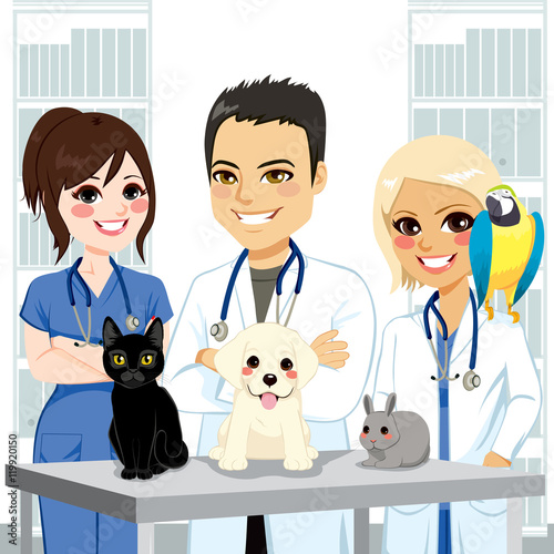 Young and happy veterinarian team at clinic with different pets