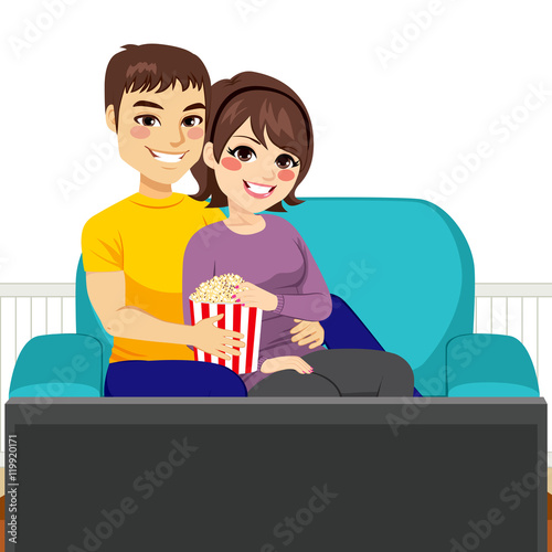 Cute young couple watching ...