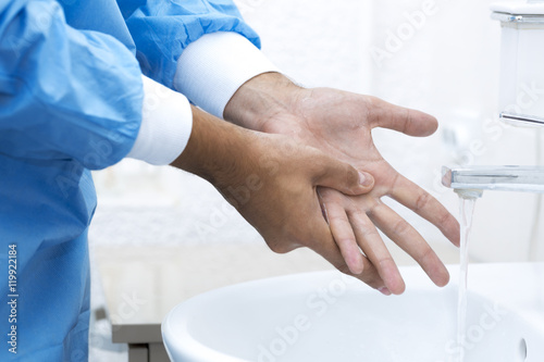 surgeon washing hands before surgery