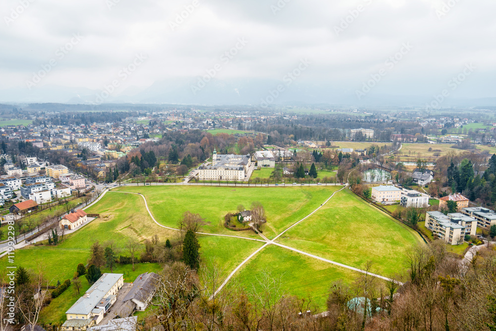 Fototapeta premium Beautiful aerial view on rooftops of Salzburg,Austria in cloudy