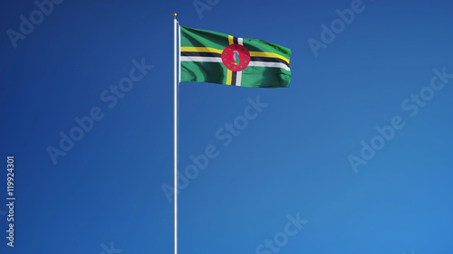 Dominica flag waving against clean blue sky, long shot, isolated with clipping path mask alpha channel transparency