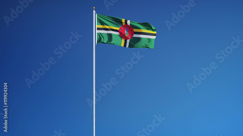 Dominica flag waving against clean blue sky, long shot, isolated with clipping path mask alpha channel transparency