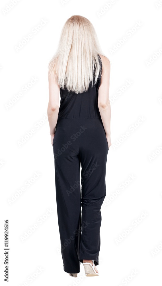 back view of walking woman. beautiful blonde girl in motion. backside view of person. Rear view people collection. Isolated over white background. back view of walking woman. beautiful blonde girl in motion. backside view of person. Rear view people collection. Isolated over white background.