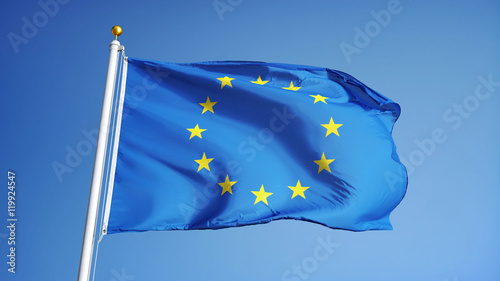 European Union flag waving against clean blue sky, close up, isolated with clipping path mask alpha channel transparency