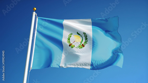 Guatemala flag waving against clean blue sky, close up, isolated with clipping path mask alpha channel transparency photo