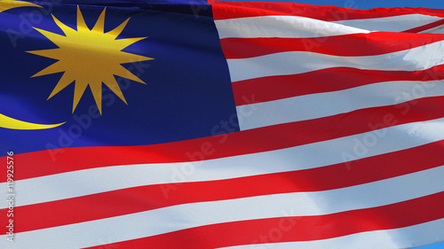 Malaysia flag waving against clean blue sky, close up, isolated with clipping path mask alpha channel transparency