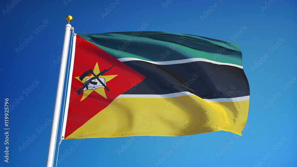 Mozambique flag waving against clean blue sky, close up, isolated with clipping path mask alpha channel transparency Mozambique flag waving against clean blue sky, close up, isolated with clipping path mask alpha channel transparency