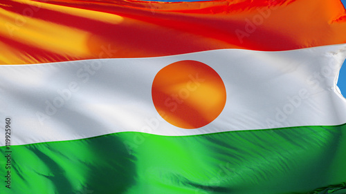 Niger flag waving against clean blue sky, close up, isolated with clipping path mask alpha channel transparency Free Download Niger flag waving against clean blue sky, close up, isolated with clipping path mask alpha channel transparency - GFXLoad