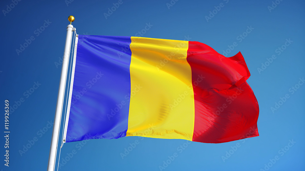 Romania flag waving against clean blue sky, close up, isolated with clipping path mask alpha channel transparency Romania flag waving against clean blue sky, close up, isolated with clipping path mask alpha channel transparency
