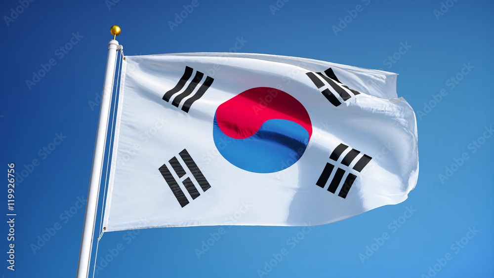 Fototapeta premium South Korea flag waving against clean blue sky, close up, isolated with clipping path mask alpha channel transparency
