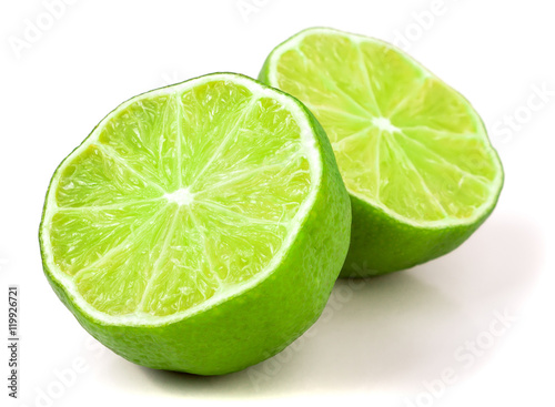 two Lime halves isolated on white background