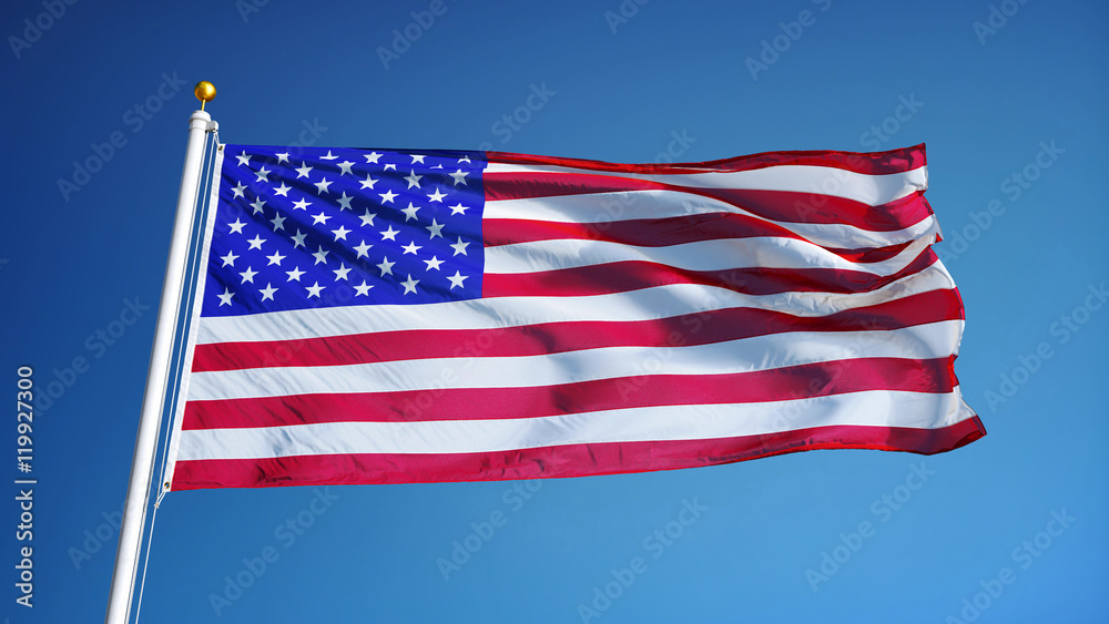 Obraz premium USA flag waving against clean blue sky, close up, isolated with clipping path mask alpha channel transparency