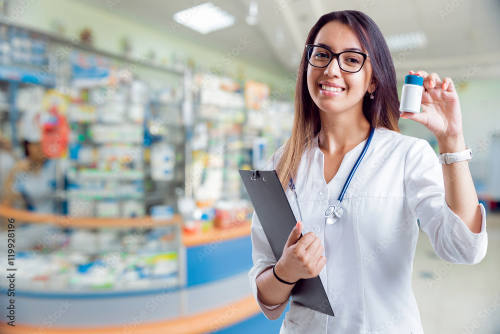 Pharmacist showing medication