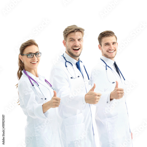 Portrait of an assertive medical team against a white background
