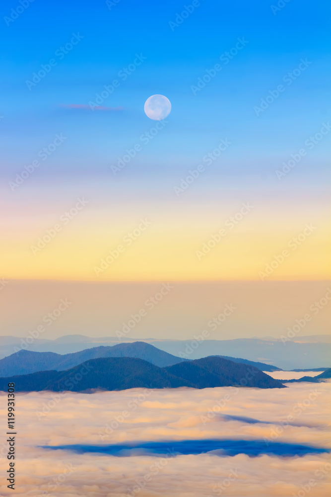 Picturesque sunrise morning in mountains above clouds, Carpathia