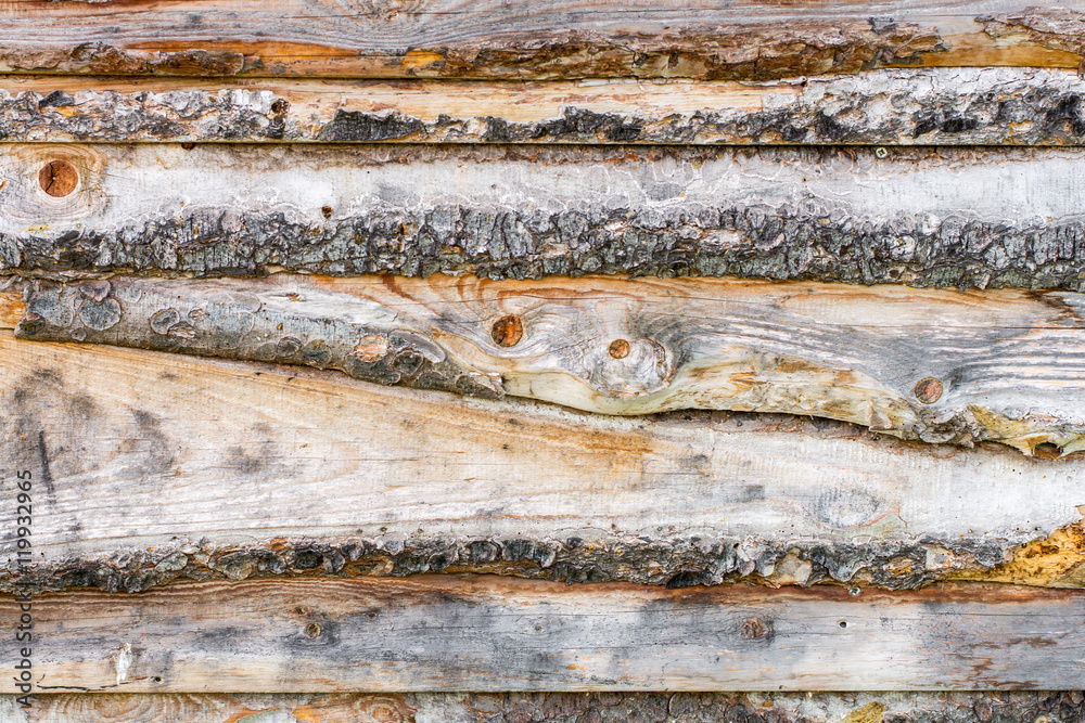 Holzfassade aus Schwartenbrettern StockFoto Adobe Stock
