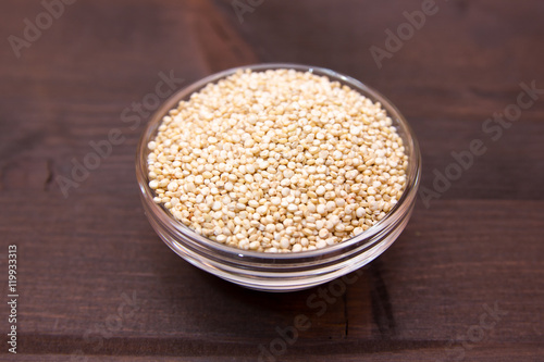 Bowl with quinoa on a wooden table