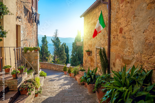 Fototapeta Naklejka Na Ścianę i Meble -  Small Mediterranean town - lovely Tuscan stree