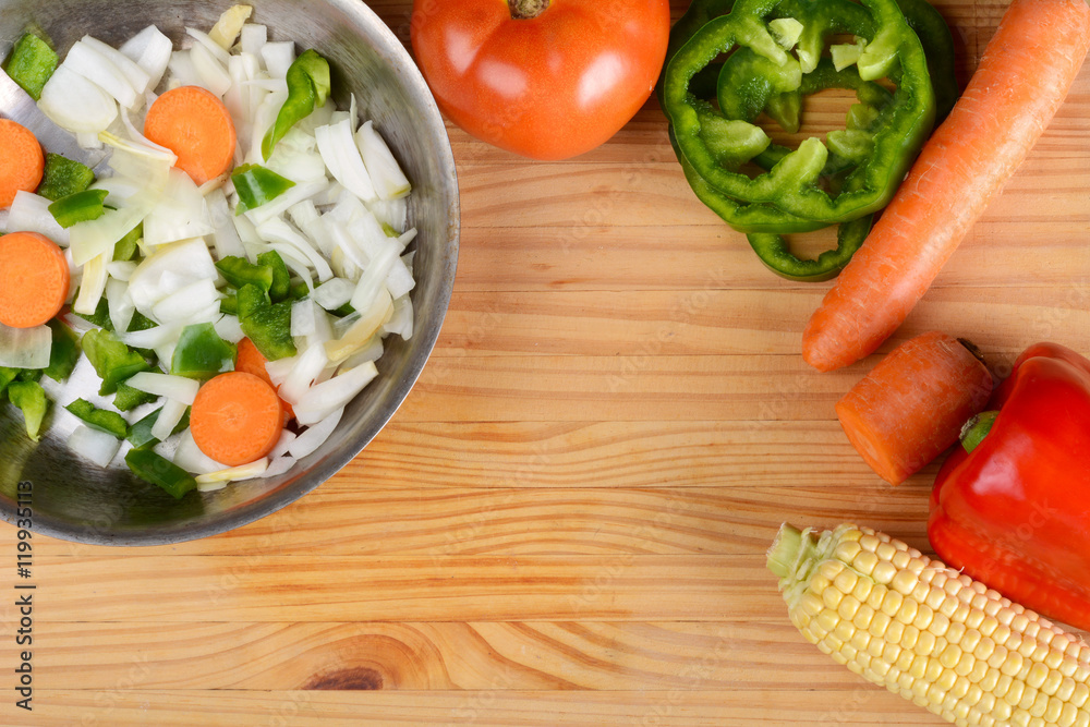 Vegetables and seasonings on wooden table. Vegetables and seasonings on wooden table.