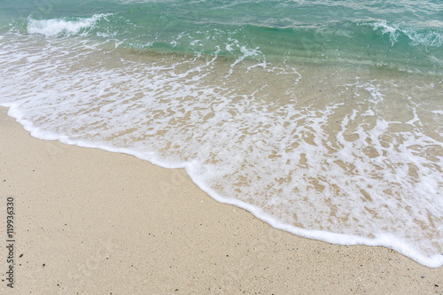 Sea waves on a white sandy beach