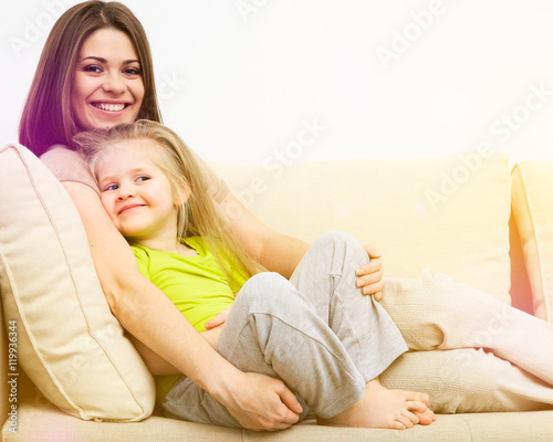  smiling girl with mother © Yuriy Shevtsov