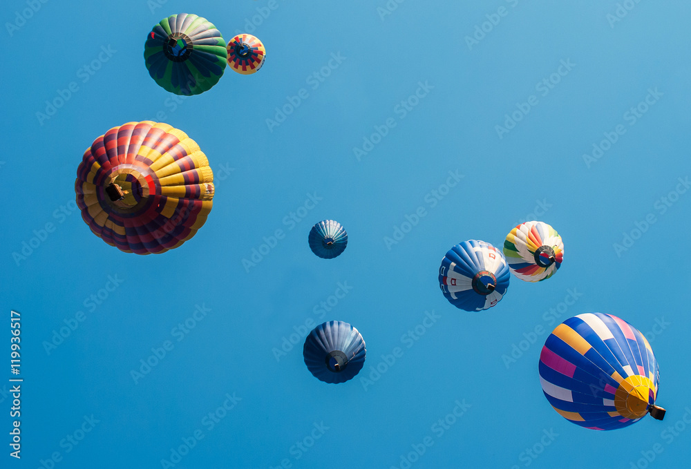 Fototapeta premium colored balloons on a blue background