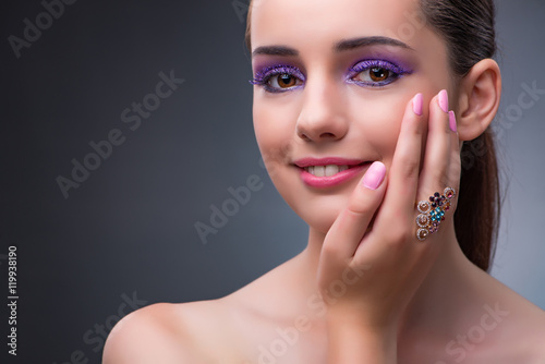 Beautiful woman with jewellery in fashion concept