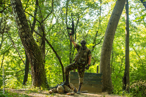 Canvas Print Soldier and killed enemy