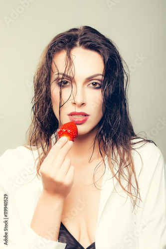 sexy pretty woman with red strawberry