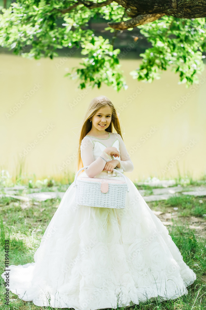 small girl in white dress outdoor