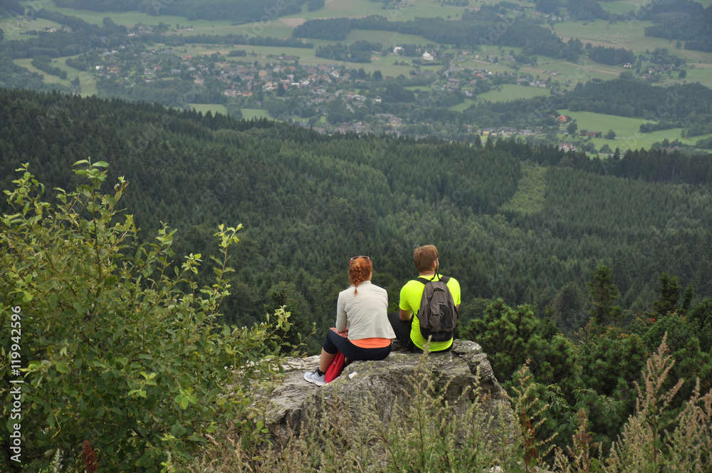 Couple on top of a mountain