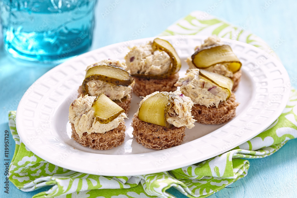 Canapes with fish pate and pickle Canapes with fish pate and pickle