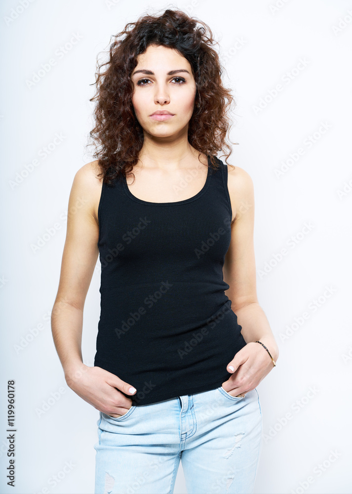 Young woman pose with curly hair Young woman pose with curly hair