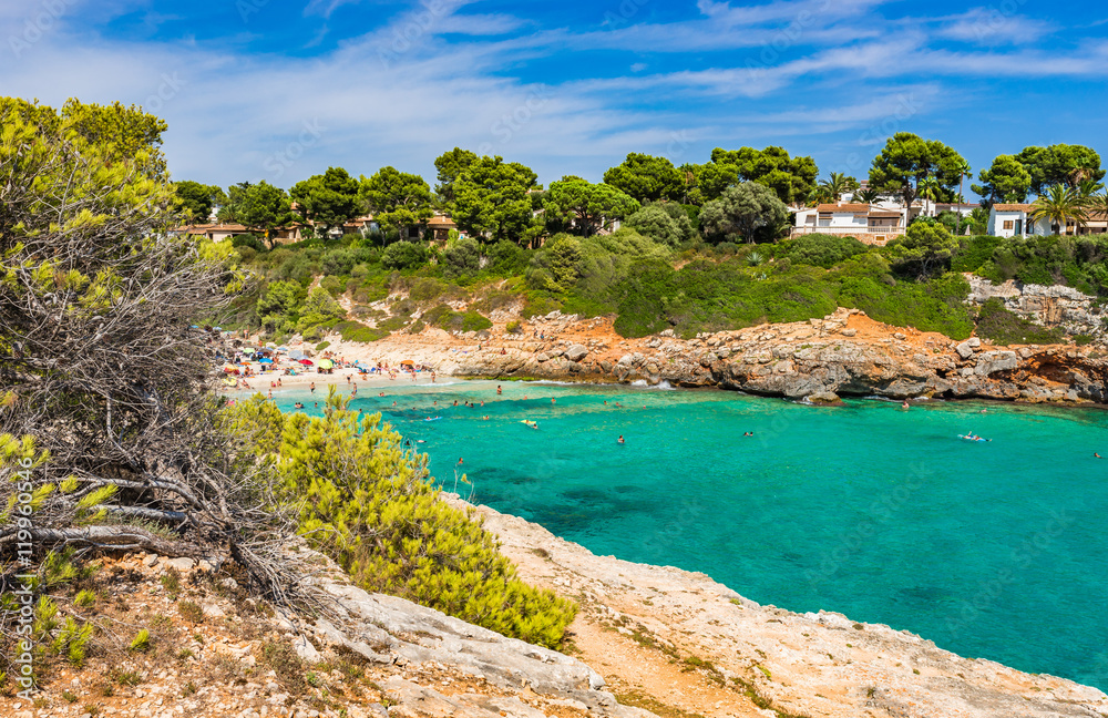 Summer holiday at Spain Majorca bay beach of Cala Anguila