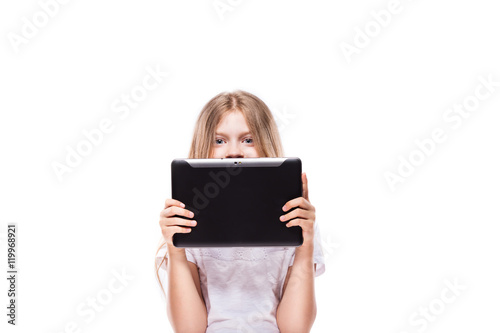 Pretty young girl with black tablet isolated on white