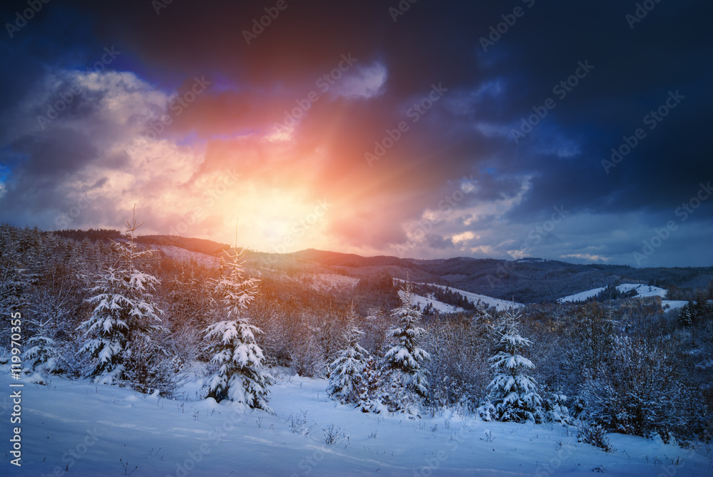 Bright sunrise in a Carpathian mountain valley