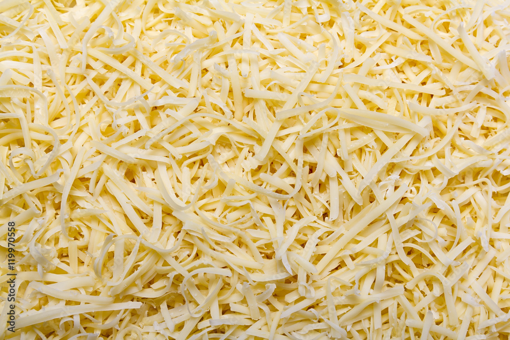 Grated Pizza Cheese (Mozzarella ) Close Up Grated Pizza Cheese (Mozzarella ) Close Up