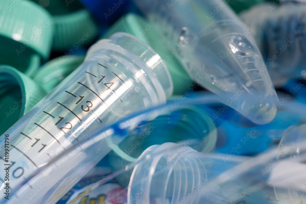 Close-up detail of multiple test tubes and their lids Close-up detail of multiple test tubes and their lids