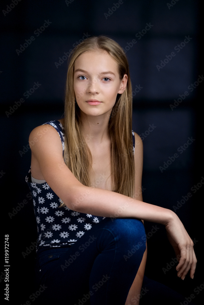 Low key portrait of young sensual girl with natural makeup and b Low key portrait of young sensual girl with natural makeup and b