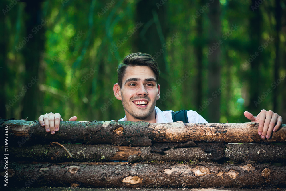 Fototapeta premium The guy looking over the fence
